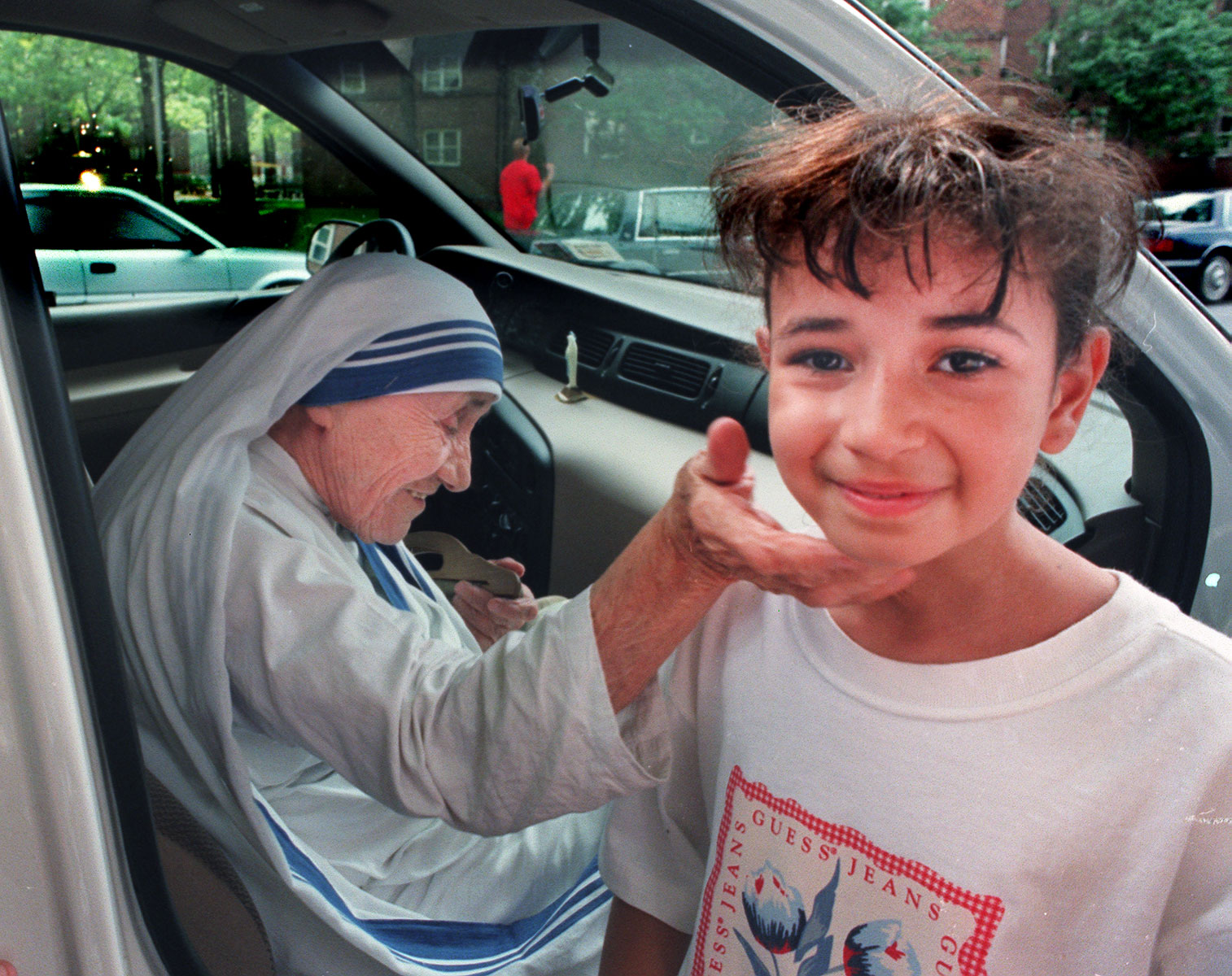 Mother Teresa with Bronx girl ©Susan Farley Photography/NYC and Westchester Portrait Photographer : Celebrity Portraits : Susan Farley NYC Freelance PHOTOGRAPHER New York City, NY Portrait and Event Photography by Susan Farley Photography, New York and WESTCHESTER,NY FREELANCE PHOTOJOURNALIST IS AN AWARD-WINNING PHOTOJOURNALIST IN NEW YORK CITY & WESTCHESTER COUNTY FREELANCE