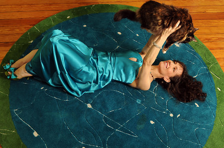Woman with her cat on  Rug she designed.Best NYC  event, Portrait and Corporate freelance photographer